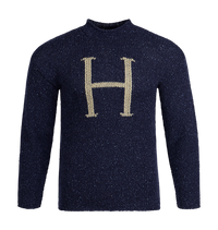 A navy blue knit sweater with the bold pale letter 'H' on the front.